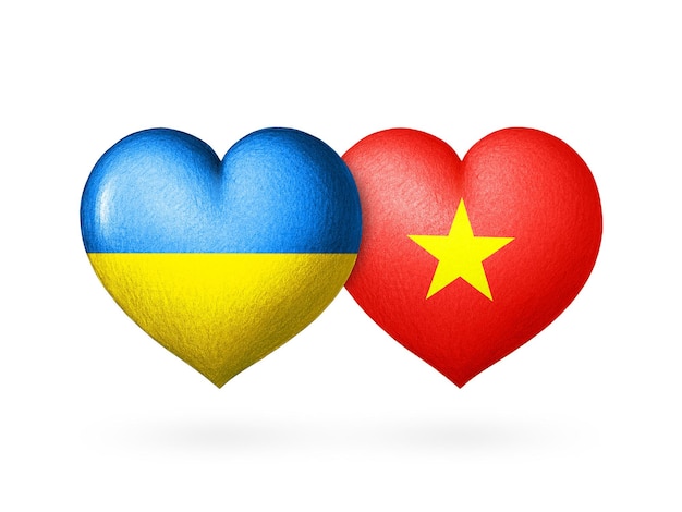 Drapeaux de l'Ukraine et du Vietnam Deux coeurs aux couleurs des drapeaux