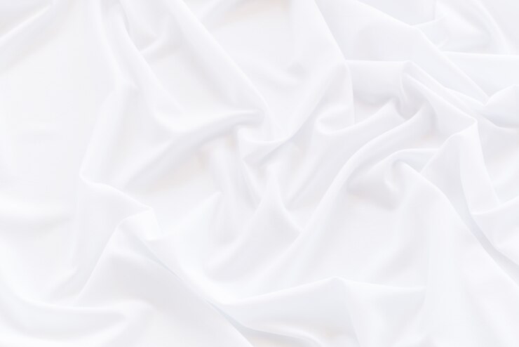 Photo draperie en tissu blanc, satin blanc froissé pour le fond