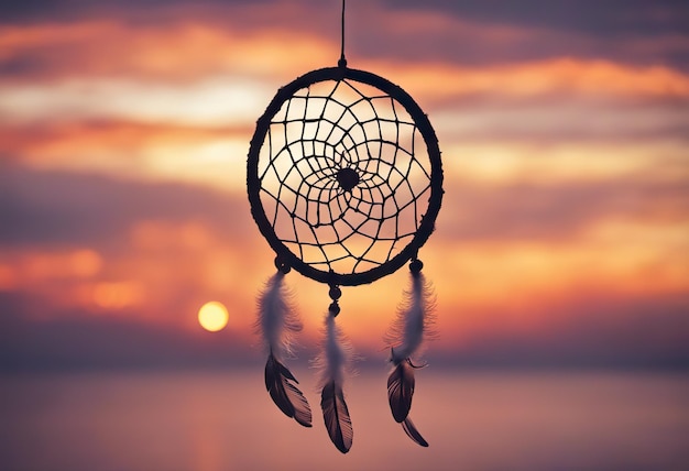 Dreamcatcher coucher de soleil ciel boho chic symbole d'amulette ethnique fête des peuples autochtones et amérindiens