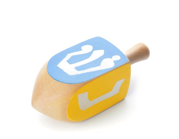 Dreidel pour Hanoukka sur fond blanc