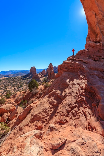 Du Prince d'un homme sur les rochers Arches National Park USA