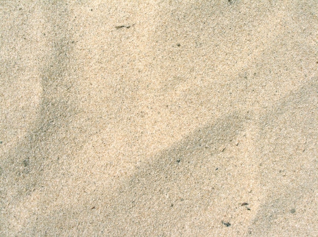 Photo du sable propre sur la plage en arrière-plan vue de haut en gros plan