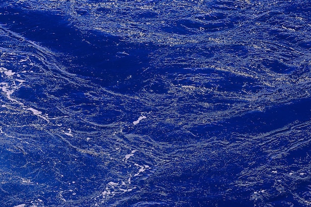 l'eau de la mer fond abstrait vagues fond bleu, nature eau de l'océan humide avec des ondulations