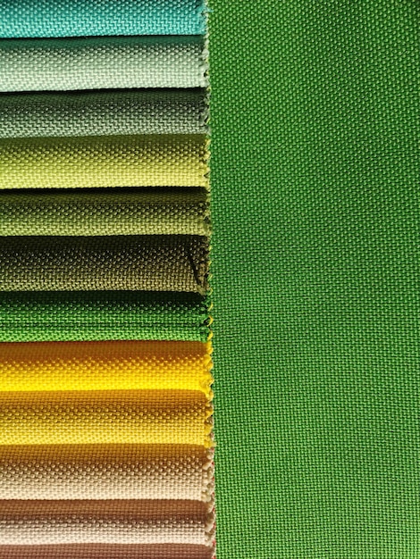 Des échantillons de fond de texture de tissu coloré. Échelle verte.