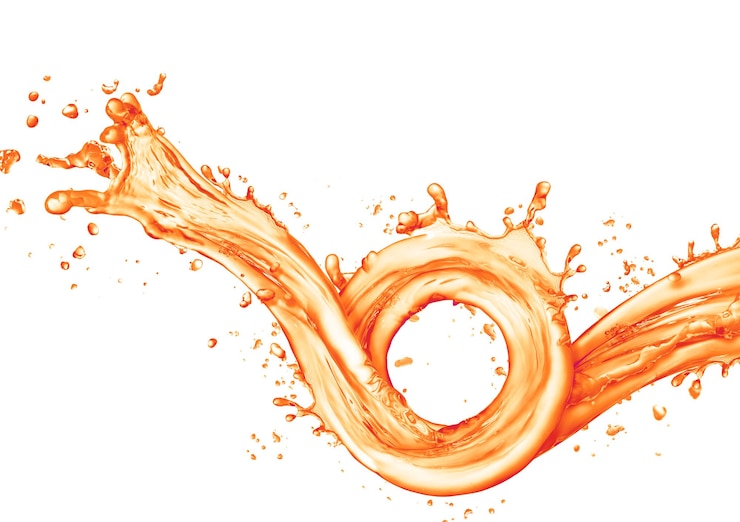 Photo éclaboussure de jus d'orange isolé sur fond blanc