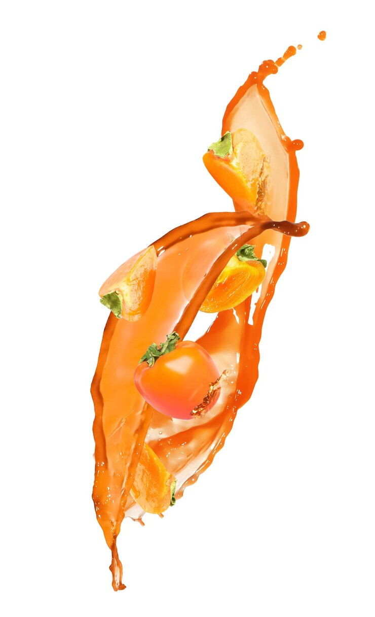 Photo éclaboussures de délicieux jus de kaki sucré et de fruits sur fond blanc