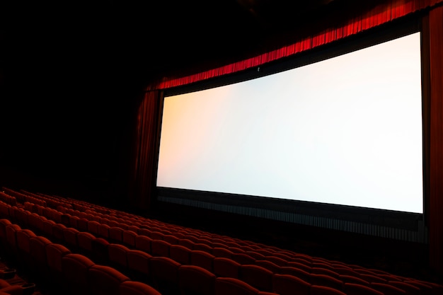 Photo Écran de cinéma avec sièges rouges ouverts