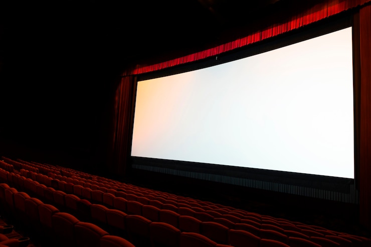 Photo écran de cinéma avec sièges rouges ouverts