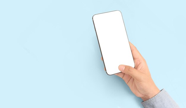 Photo Écran tactile d'un smartphone tenu à la main