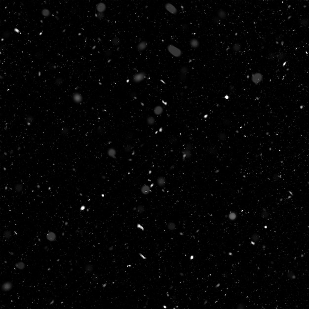 Effet de texture de neige blanche naturelle isolée sur fond de nuit noire