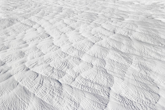 Photo effet de texture des vagues sur la surface de la pierre gris-blanc