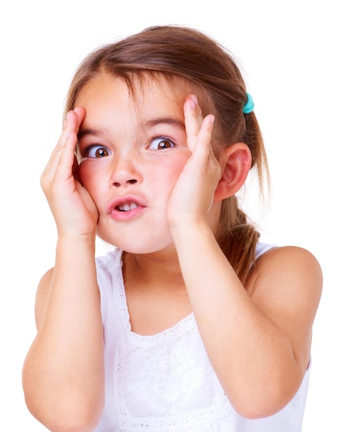 Elle ne peut pas le croire Studio photo d'une jolie petite fille tirant un visage pour l'appareil photo