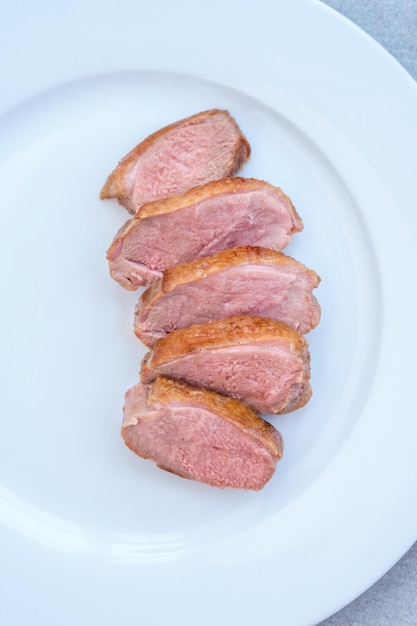 Emincé de magret de canard frit