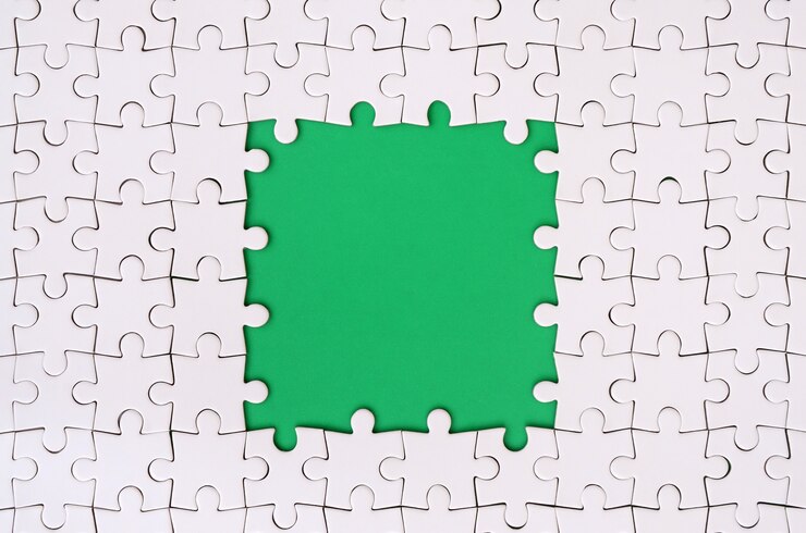 Photo encadrement sous la forme d&#39;un rectangle, constitué d&#39;un puzzle blanc autour de l&#39;espace vert