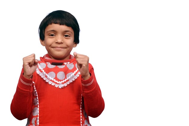 Enfant excité indien avec le sourire