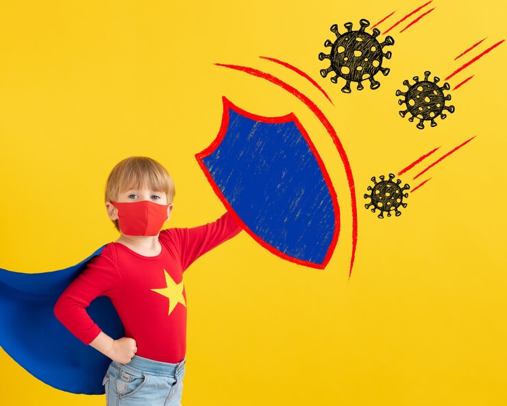 Photo enfant de super-héros portant un masque de protection à l'intérieur
