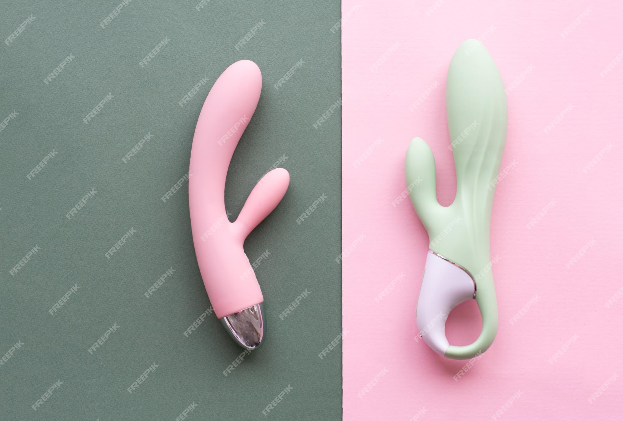 Un Ensemble De Jouets Pour Adultes Sur Fond Vert Et Rose