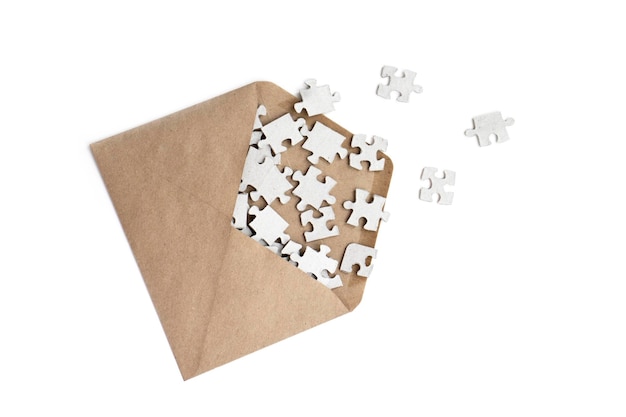 Enveloppe avec pièces de puzzle