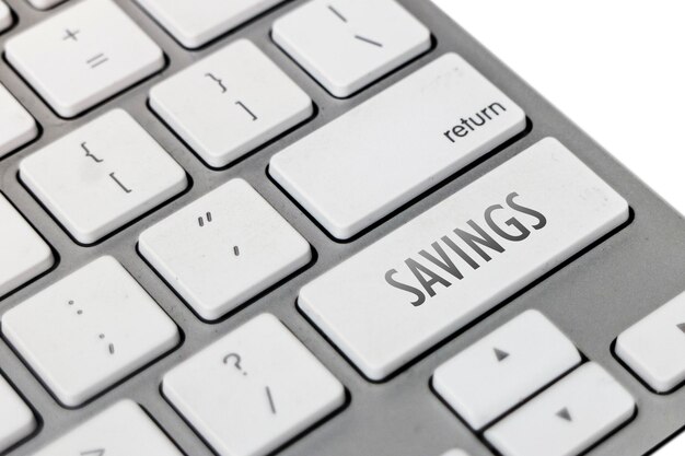 Épargne le concept de mot sur le clavier de l'ordinateur portable