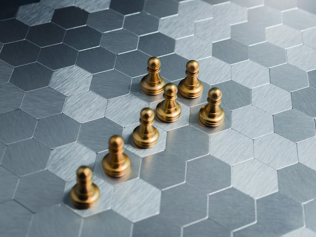 L'équipe de pièce d'échecs de pion d'or debout comme une forme de flèche sur fond de plancher de panneau de modèle hexagonal Leadership travail d'équipe planification de l'unicité et des concepts de croissance et de réussite de l'entreprise