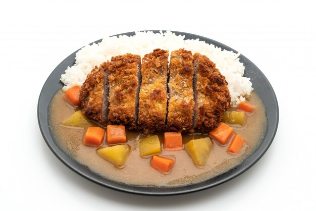 Escalope de porc frite croustillante au curry et riz