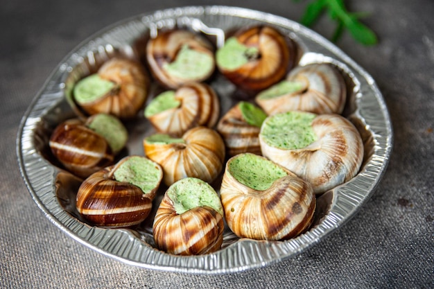 escargots aliments prêts à manger repas sains frais snack alimentation sur la table copie espace arrière-plan alimentaire
