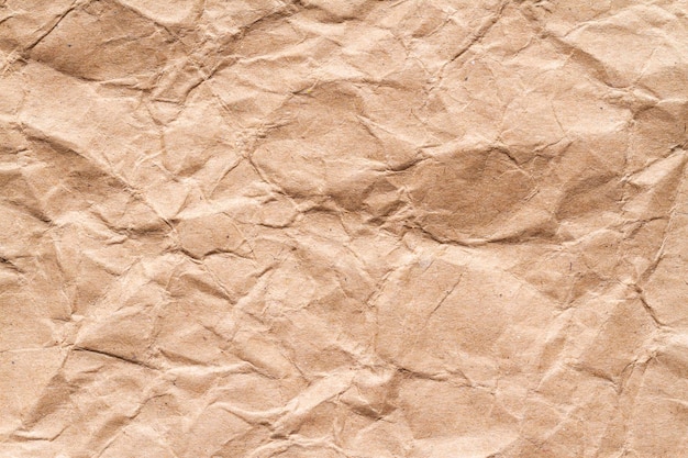 Espace de texture de papier froissé marron pour le texte