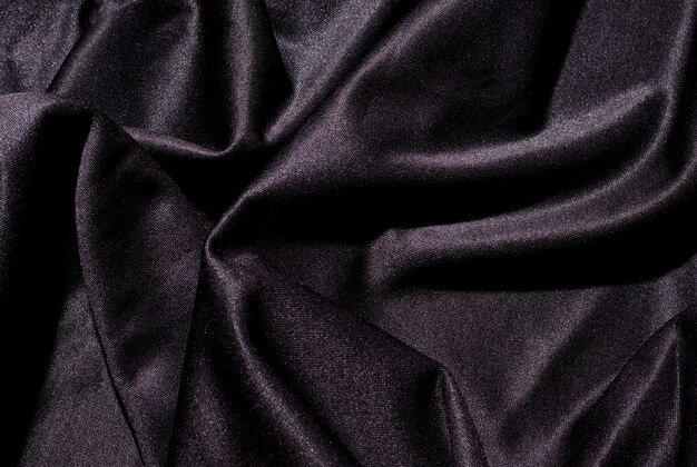 espace texture tissu noir couché vagues