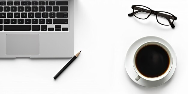 Un espace de travail de bureau avec un ordinateur portable de bureau une tasse de café verres et crayons fond blanc