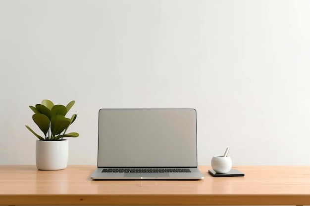 Espace de travail serein avec ordinateur portable et plantes succulentes sur un bureau minimaliste AI générative