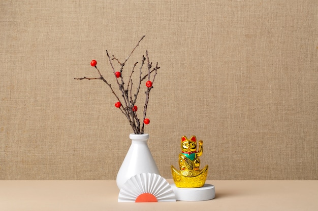 Photo esthétique japonaise avec des branches dans un vase