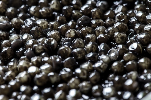 Esturgeon noir de caviar, mets raffinés d'élite, gros plan, mise au point sélective.