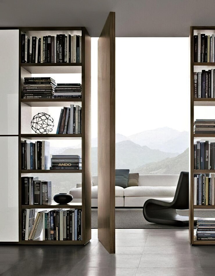 Photo une étagère avec des livres et une bibliothèque avec une vue sur la montagne en arrière-plan