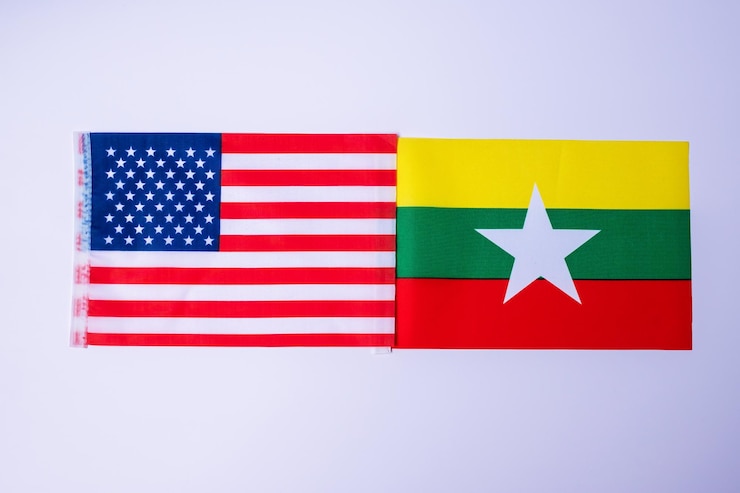 Photo états-unis d'amérique contre les drapeaux du myanmar sanctions conflit de guerre politique et relations