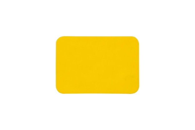 Photo Étiquette autocollante en plastique jaune isolé sur fond blanc