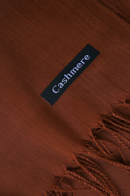 Étiquette De Tissu De Fond Textile Chocolat Texture Cachemire Marron Foncé Sur écharpe En Cachemire Café Mater...