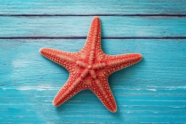 Une étoile de mer sur un fond en bois bleu