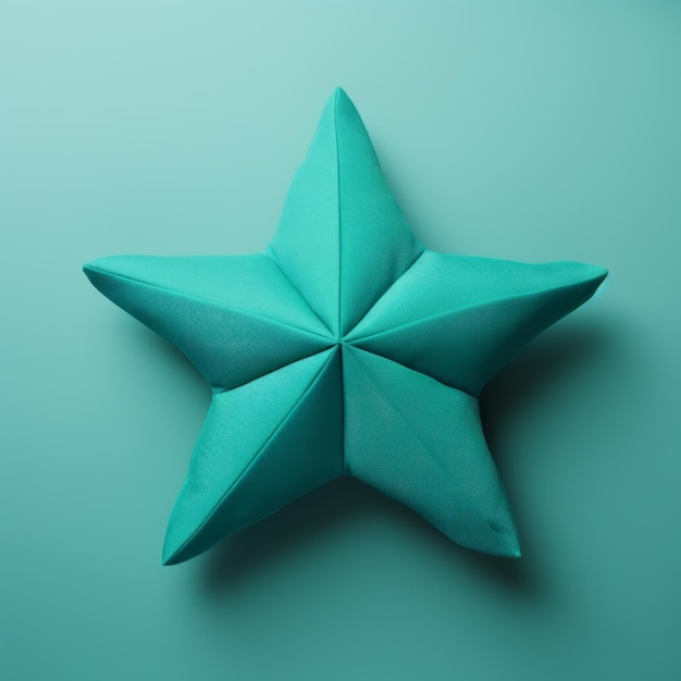 Photo Étoile d'origami teal sur fond vert art minimaliste