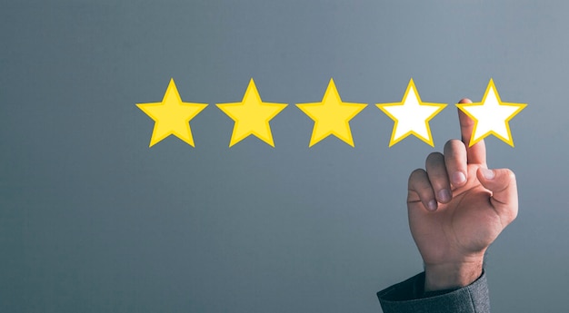 Étoiles d'or estimées Le concept de services d'évaluation