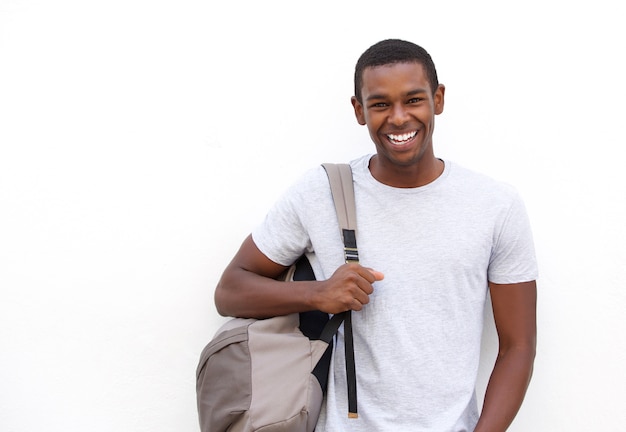 Photo Étudiant souriant avec sac