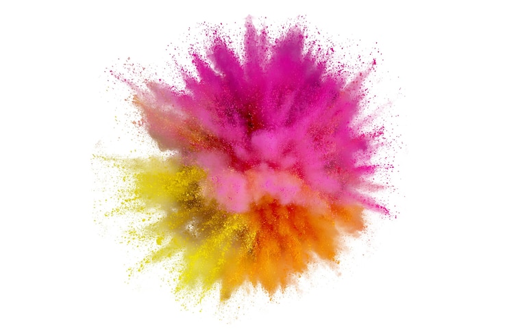 Photo explosion de poudre colorée sur fond blanc. gros plan abstrait poussière sur toile de fond. explosion colorée. peinture holi