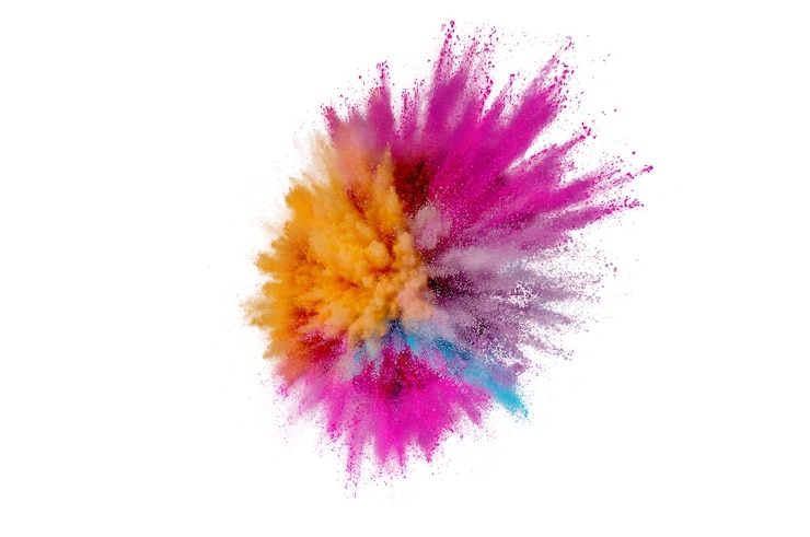 Photo explosion de poudre colorée. gros plan abstrait poussière sur toile de fond. explosion colorée. peinture holi