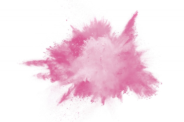 Explosion de poudre colorée rose isolée sur fond blanc. Éclaboussure de poussière rose.