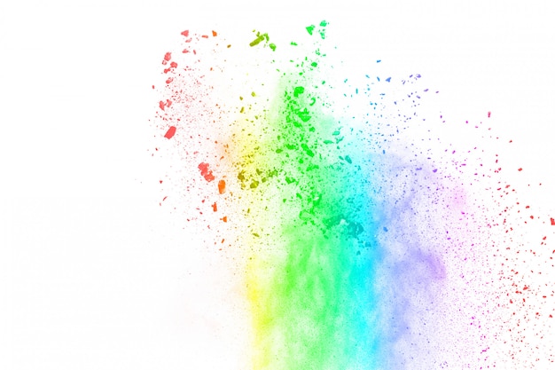 Photo explosion de poudre multicolore sur fond blanc.