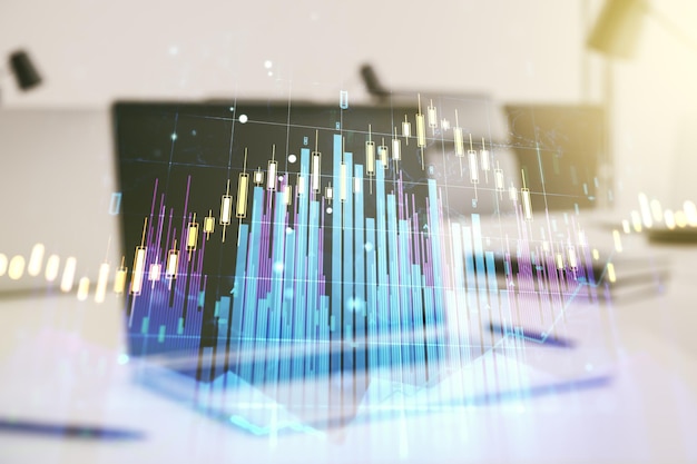 Exposition multiple d'un graphique financier créatif abstrait sur fond d'ordinateur moderne forex et concept d'investissement