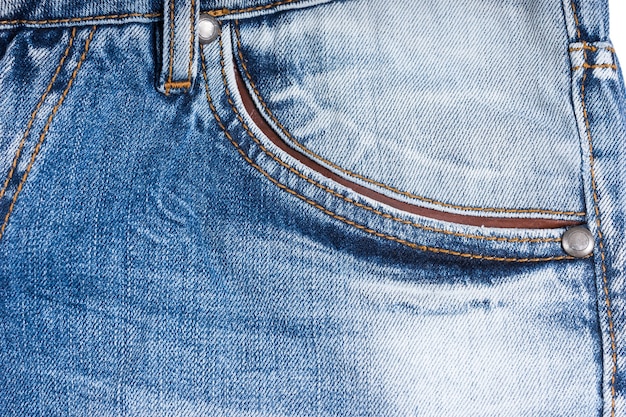 Extreme Close Up de denim usé, détail de poche de jeans bleu délavé