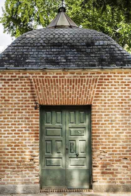 Photo façade d'un bâtiment de jardin vintage