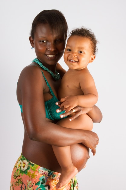 Famille africaine, mère, tenue, elle, bébé, étreinte, maman, mode