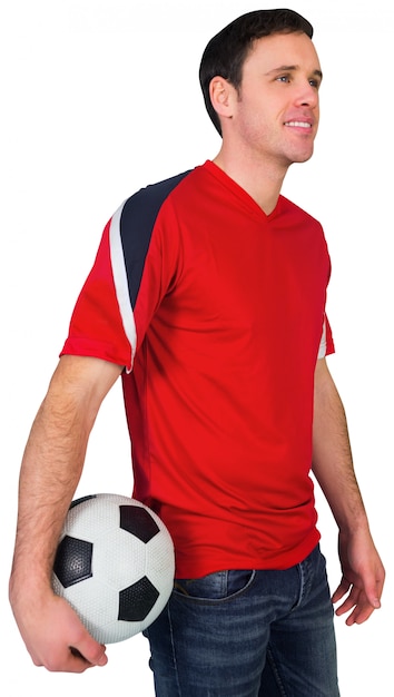 Fan de football en tenue de balle rouge
