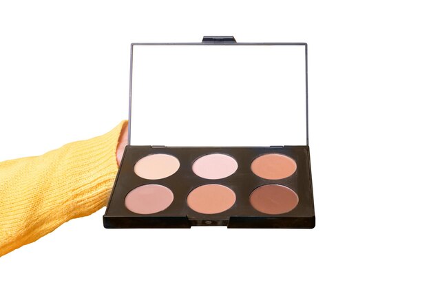 Fards à paupières et correcteurs une large palette de maquilleuse à la main Accessoires de maquillage